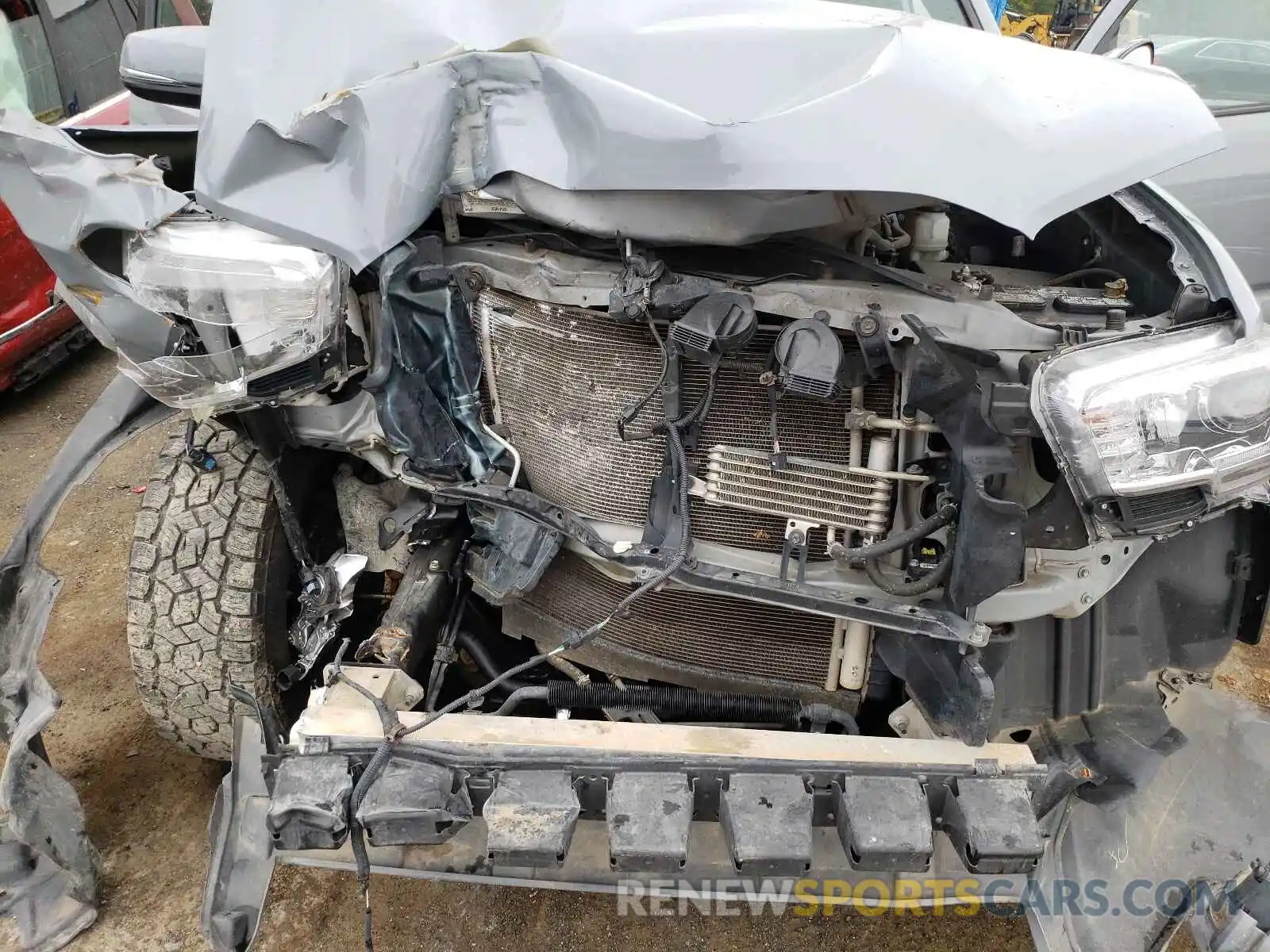 7 Photograph of a damaged car 5TFAZ5CN9KX086577 TOYOTA TACOMA 2019