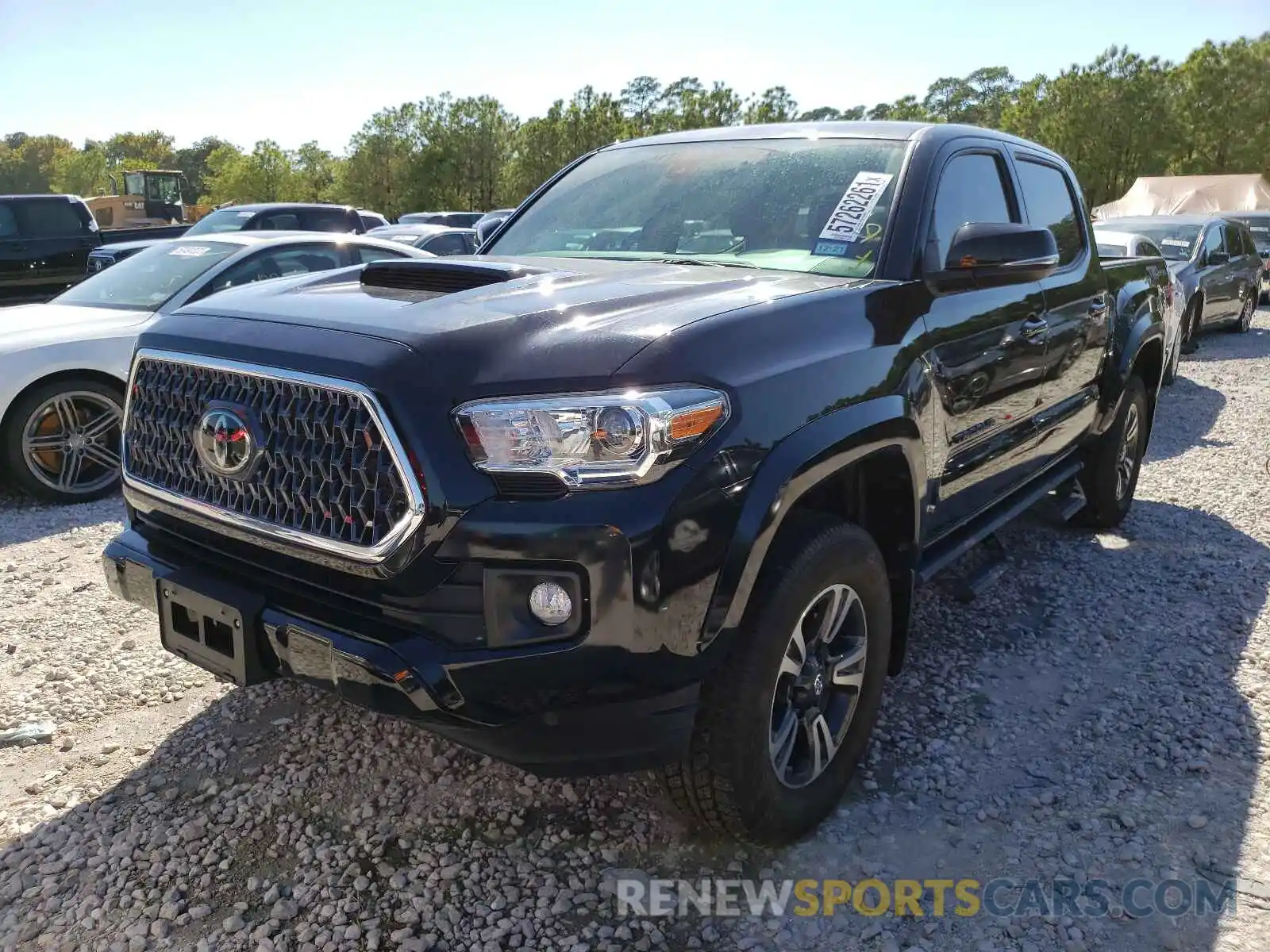 2 Photograph of a damaged car 5TFAZ5CN9KX086904 TOYOTA TACOMA 2019