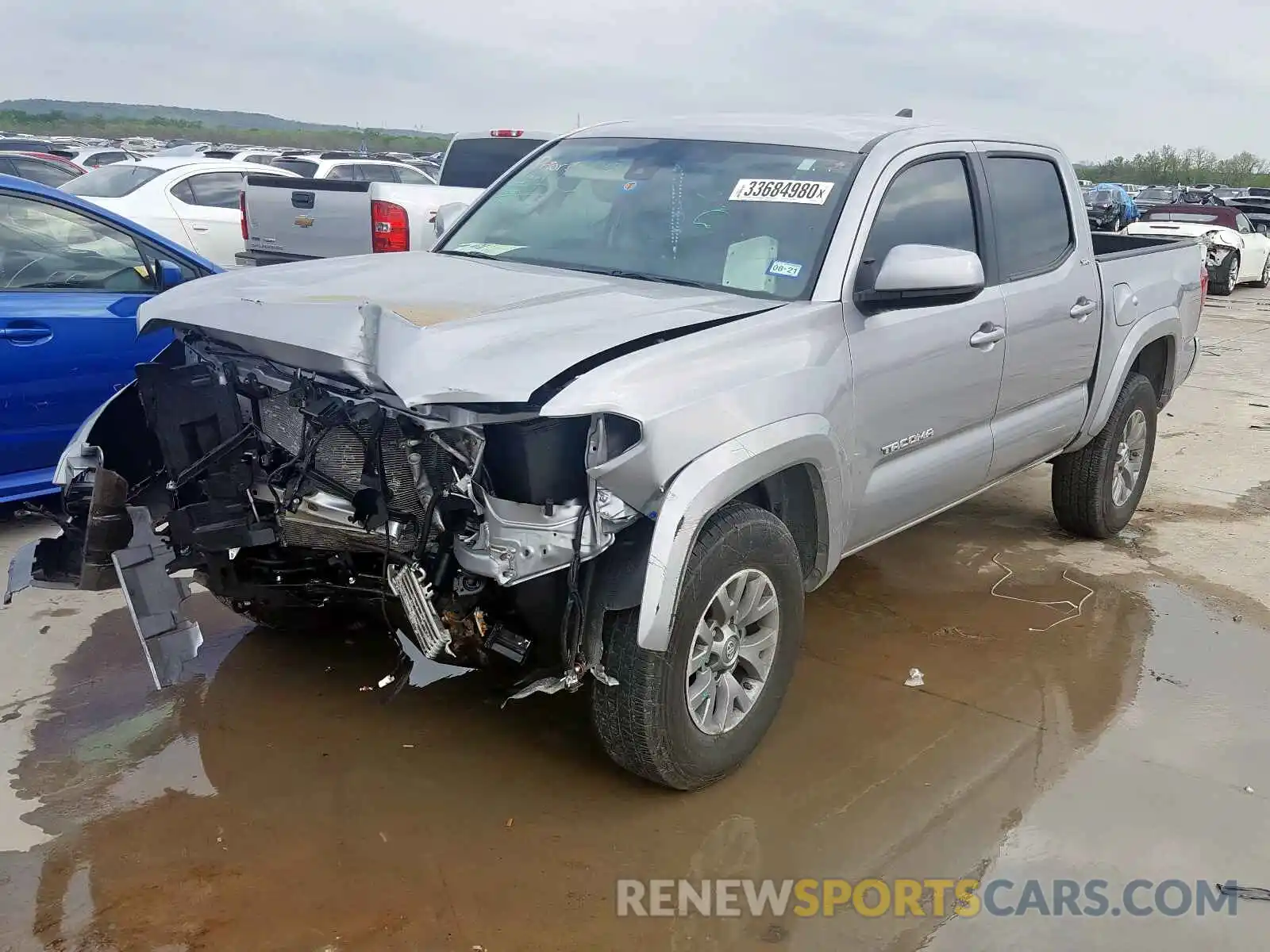 2 Photograph of a damaged car 5TFAZ5CN9KX087101 TOYOTA TACOMA 2019