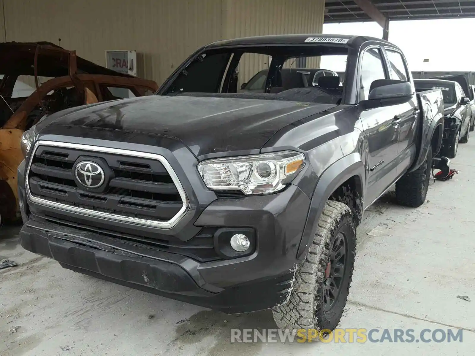 2 Photograph of a damaged car 5TFAZ5CNXKX074647 TOYOTA TACOMA 2019