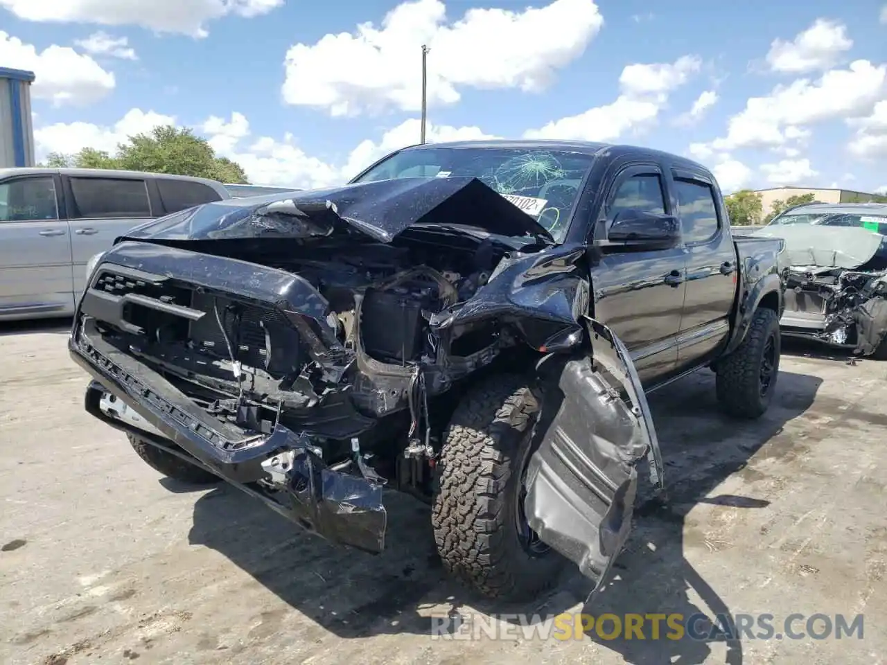 2 Photograph of a damaged car 5TFAZ5CNXKX075216 TOYOTA TACOMA 2019