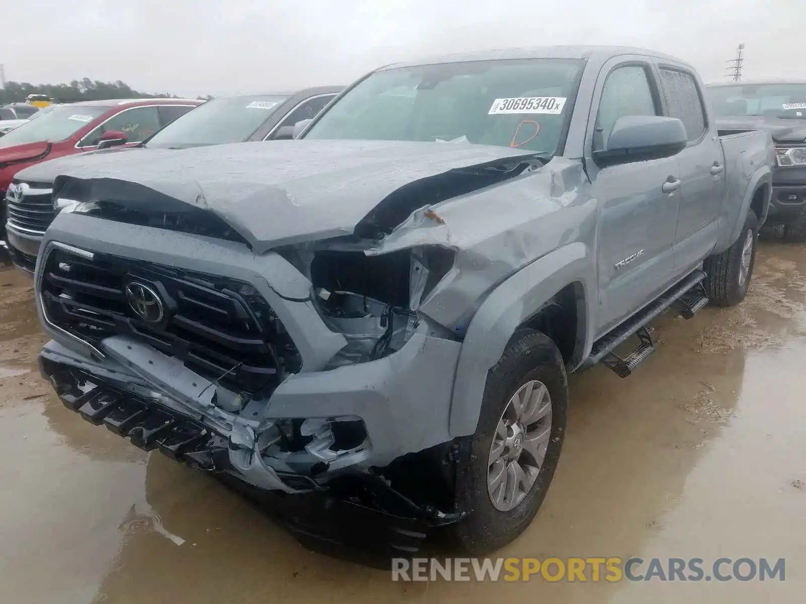 2 Photograph of a damaged car 5TFBZ5DN2KX004918 TOYOTA TACOMA 2019