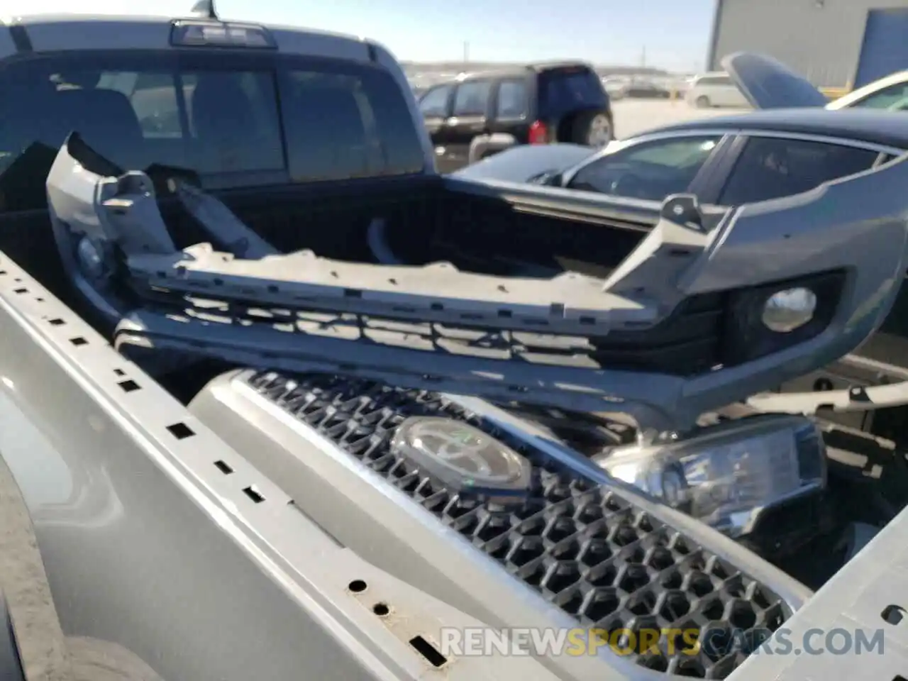 9 Photograph of a damaged car 5TFBZ5DN9KX004771 TOYOTA TACOMA 2019