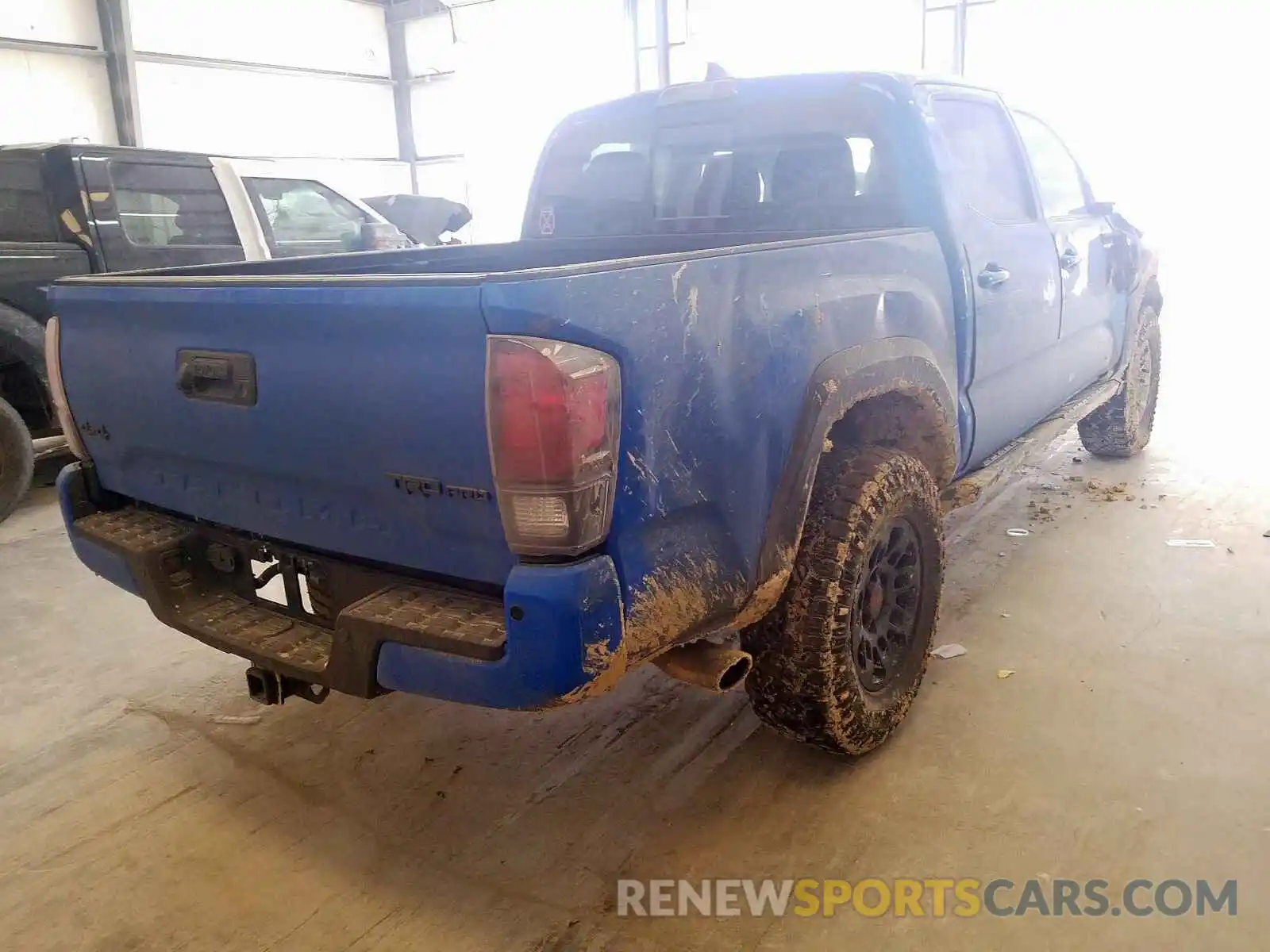 4 Photograph of a damaged car 5TFCZ5AN0KX166135 TOYOTA TACOMA 2019