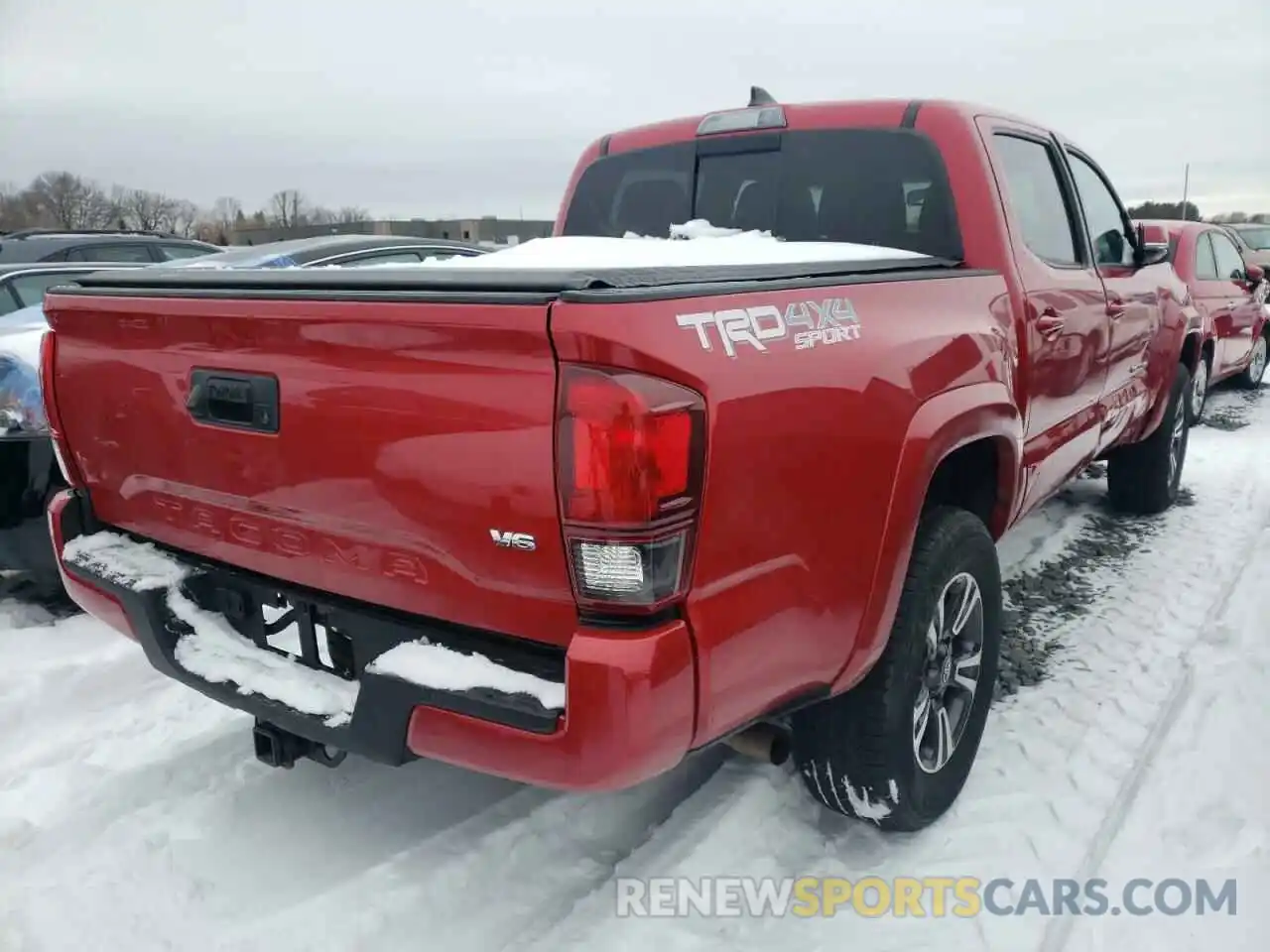 4 Photograph of a damaged car 5TFCZ5AN0KX171013 TOYOTA TACOMA 2019