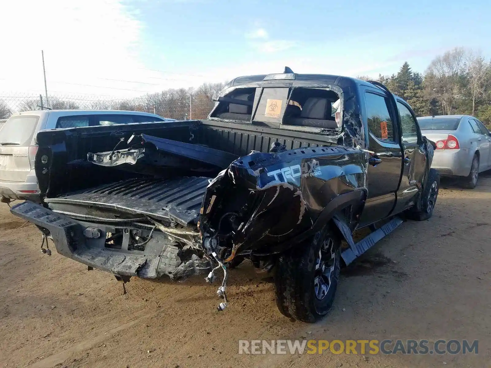 4 Photograph of a damaged car 5TFCZ5AN0KX171402 TOYOTA TACOMA 2019