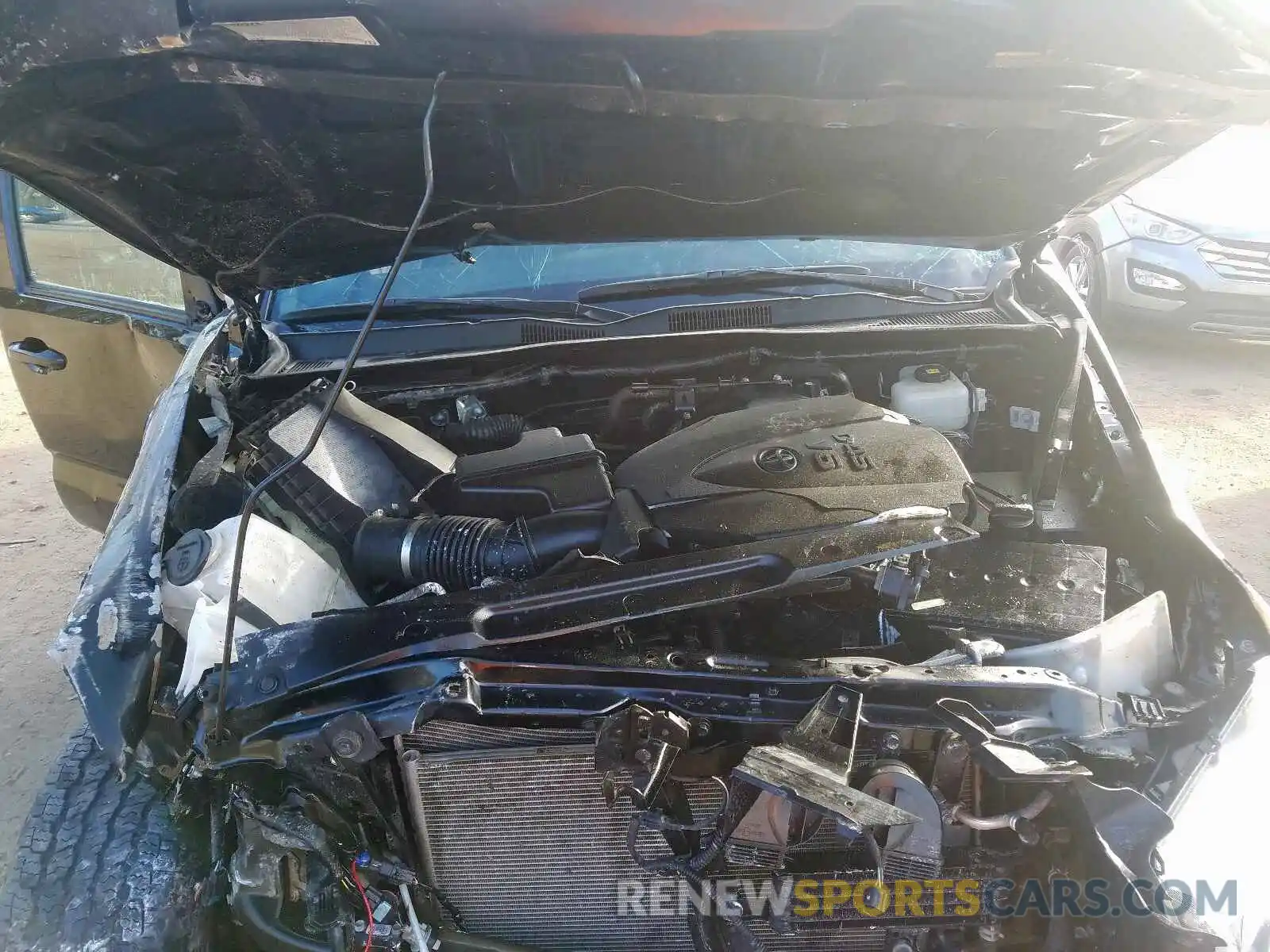 7 Photograph of a damaged car 5TFCZ5AN0KX171402 TOYOTA TACOMA 2019