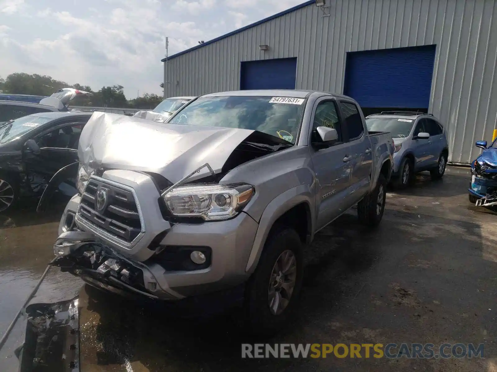 2 Photograph of a damaged car 5TFCZ5AN0KX173800 TOYOTA TACOMA 2019