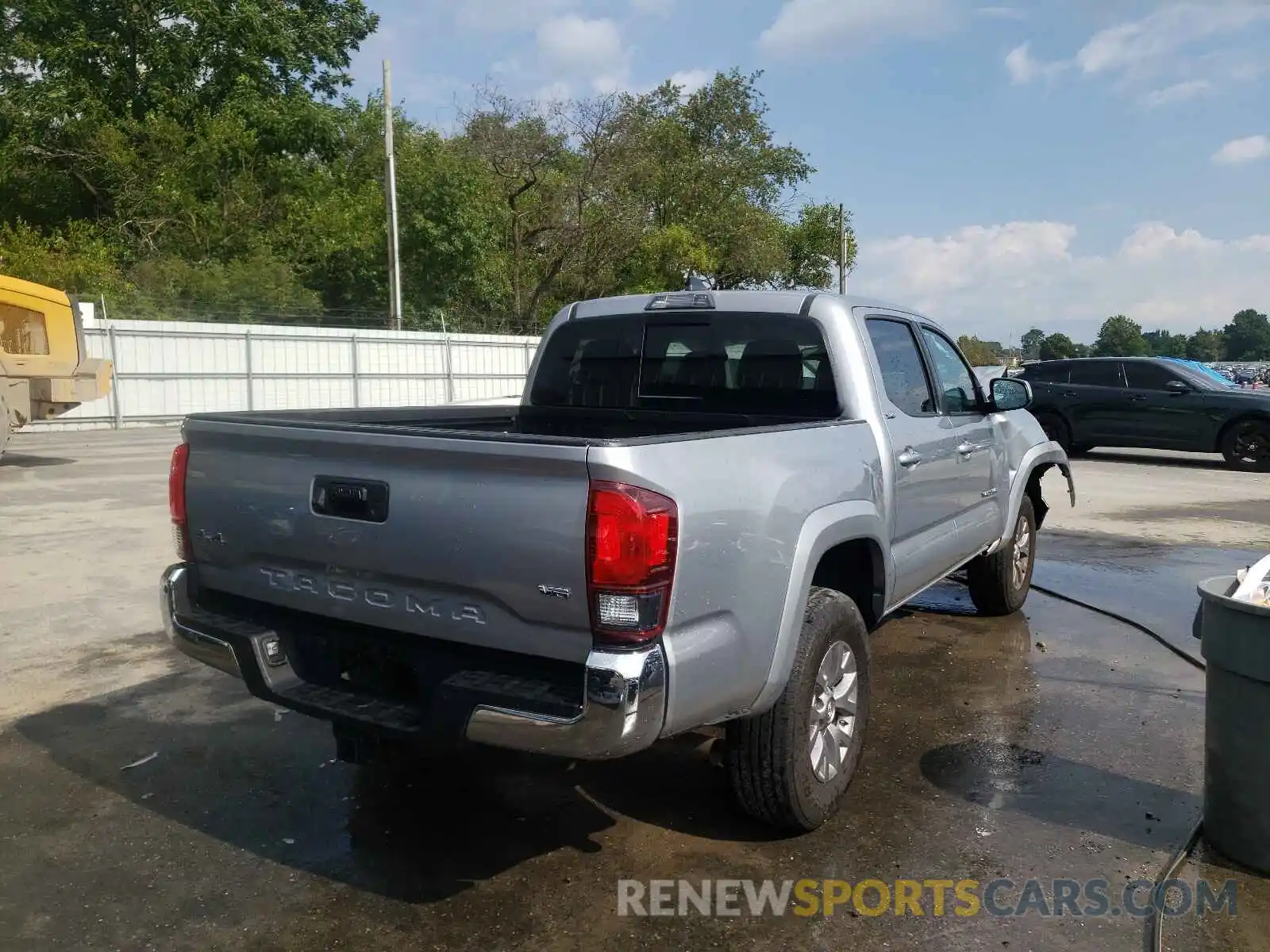 4 Photograph of a damaged car 5TFCZ5AN0KX173800 TOYOTA TACOMA 2019