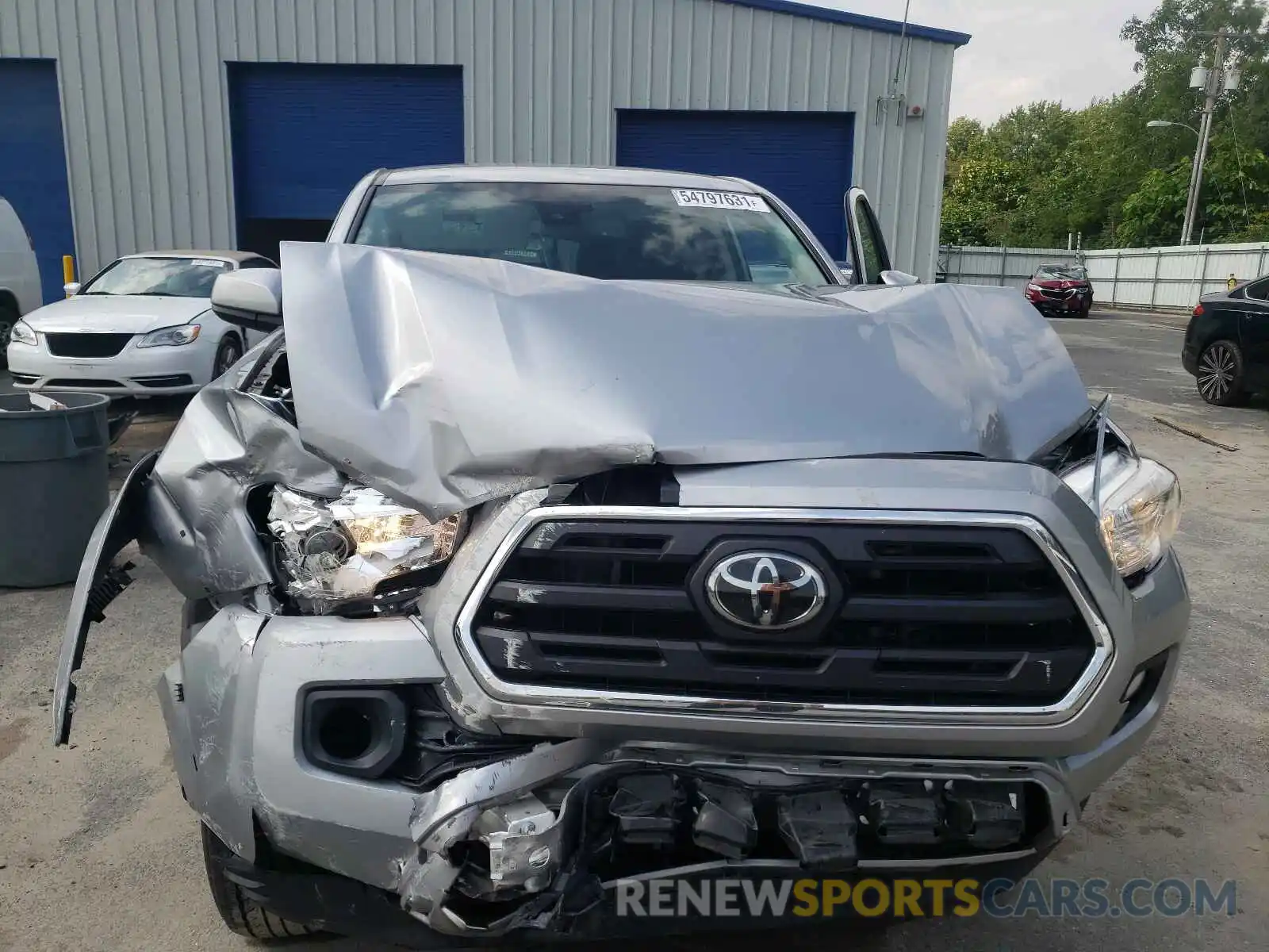 7 Photograph of a damaged car 5TFCZ5AN0KX173800 TOYOTA TACOMA 2019