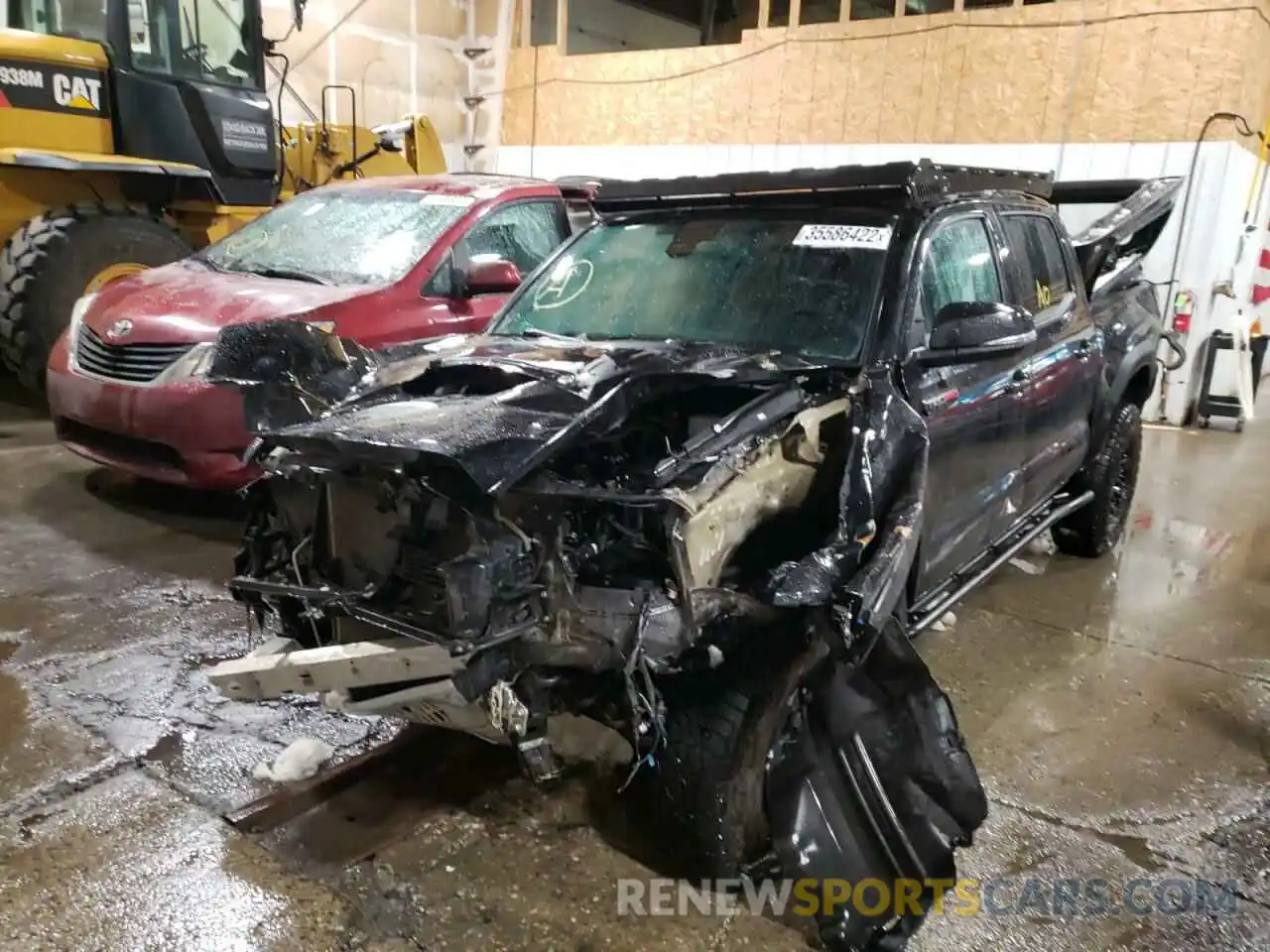 2 Photograph of a damaged car 5TFCZ5AN0KX173988 TOYOTA TACOMA 2019