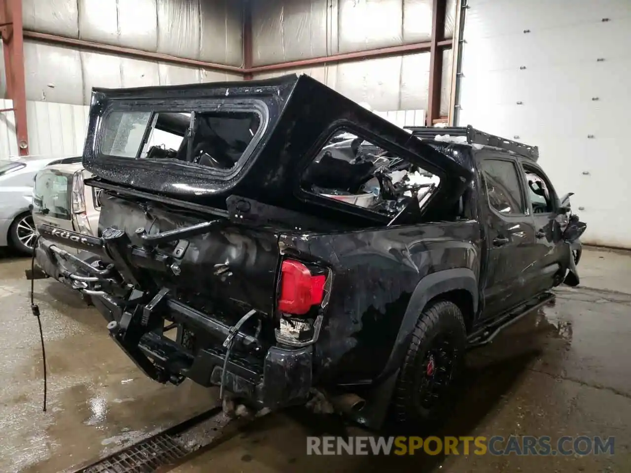 4 Photograph of a damaged car 5TFCZ5AN0KX173988 TOYOTA TACOMA 2019