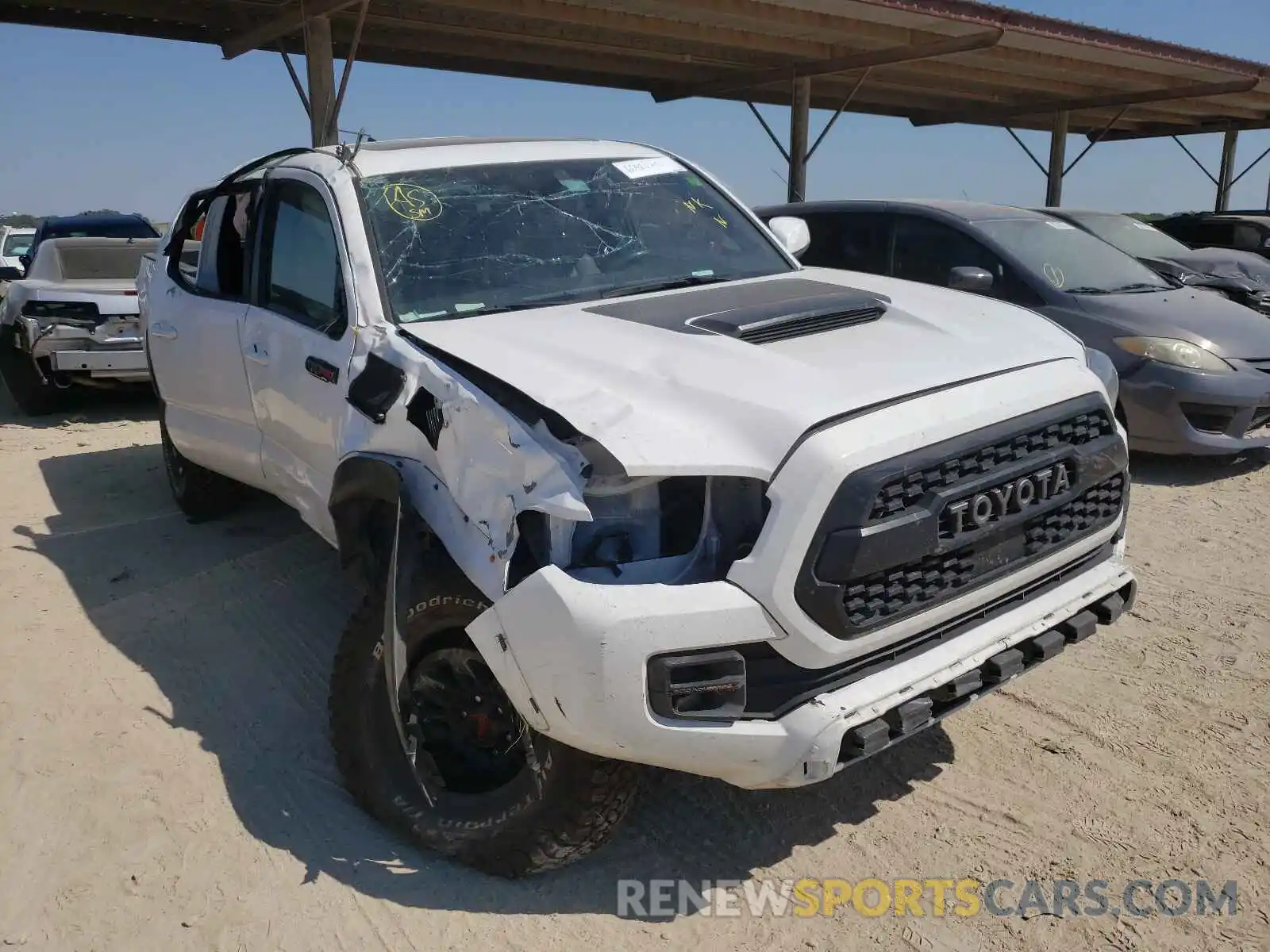 1 Photograph of a damaged car 5TFCZ5AN0KX174459 TOYOTA TACOMA 2019