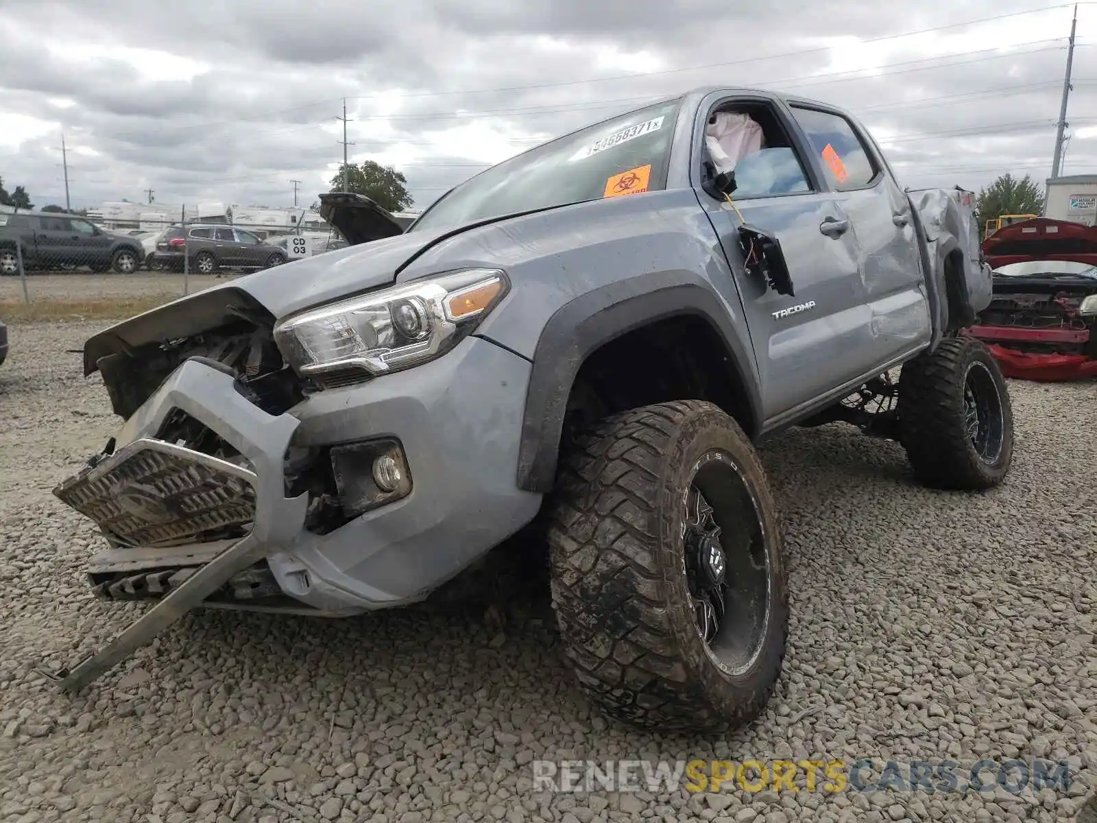 2 Photograph of a damaged car 5TFCZ5AN0KX176261 TOYOTA TACOMA 2019