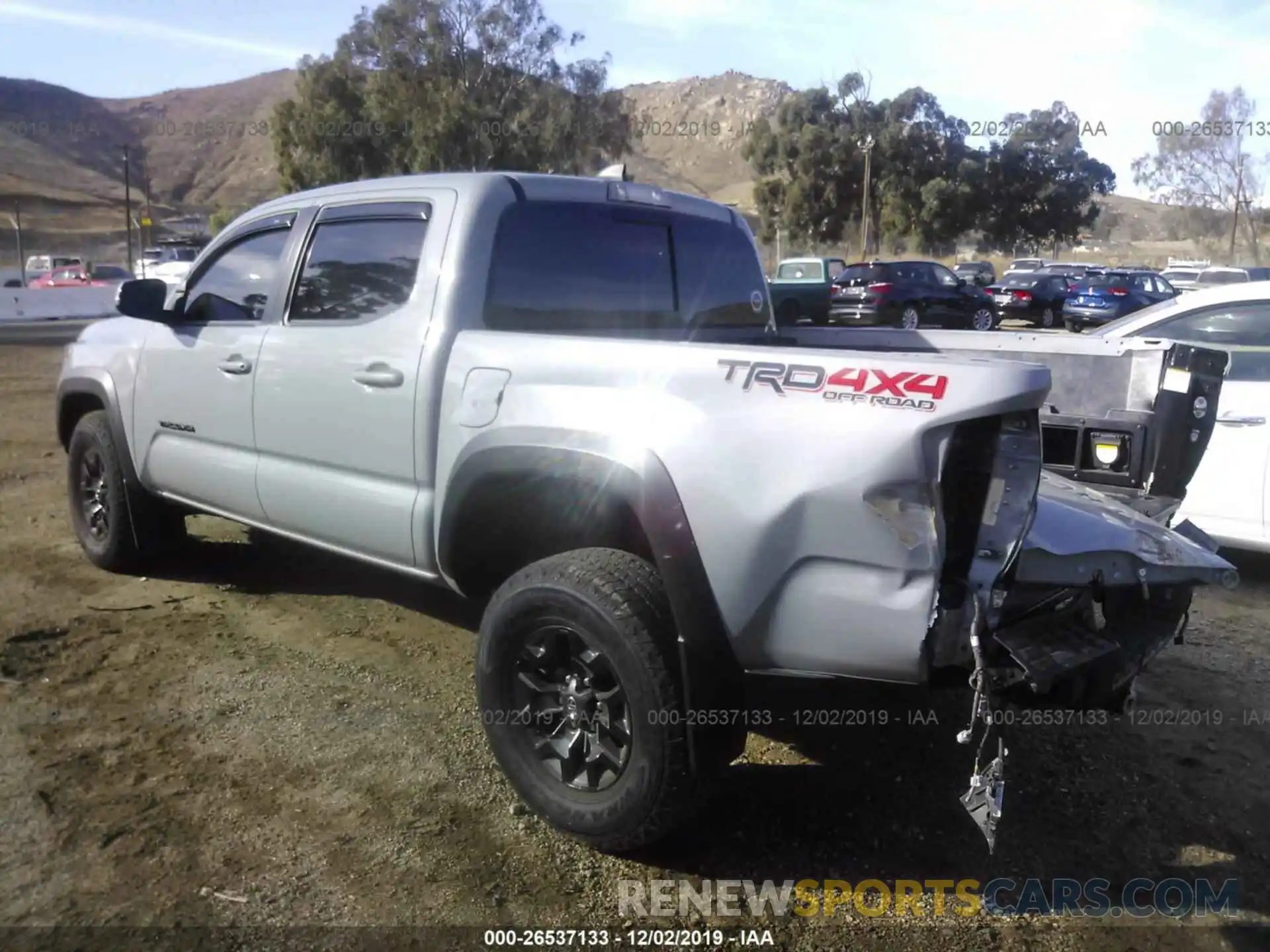 3 Photograph of a damaged car 5TFCZ5AN0KX176521 TOYOTA TACOMA 2019