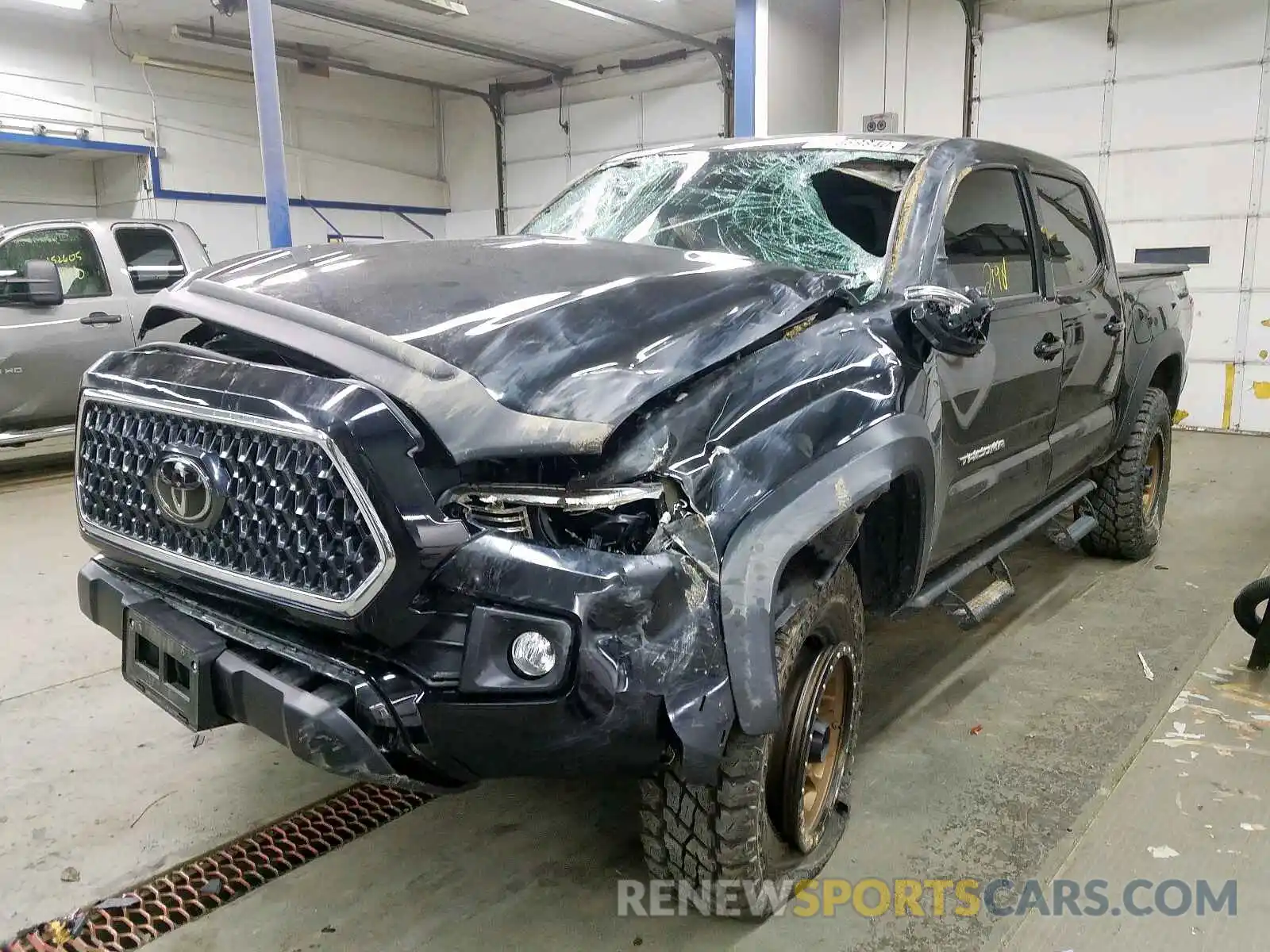 2 Photograph of a damaged car 5TFCZ5AN0KX179578 TOYOTA TACOMA 2019