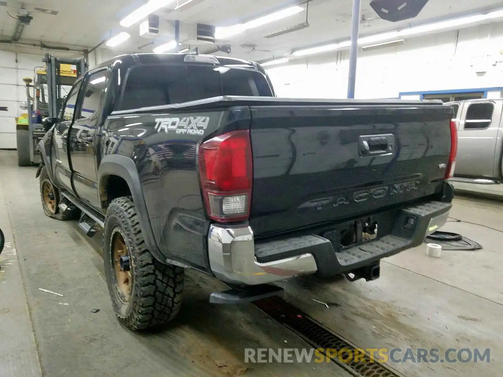 3 Photograph of a damaged car 5TFCZ5AN0KX179578 TOYOTA TACOMA 2019