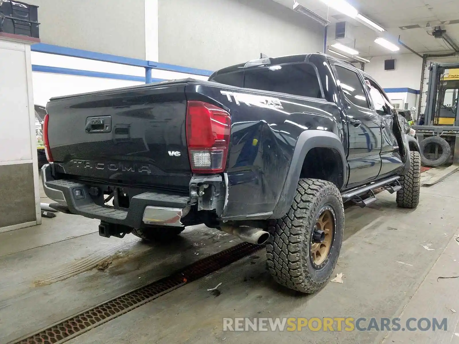 4 Photograph of a damaged car 5TFCZ5AN0KX179578 TOYOTA TACOMA 2019