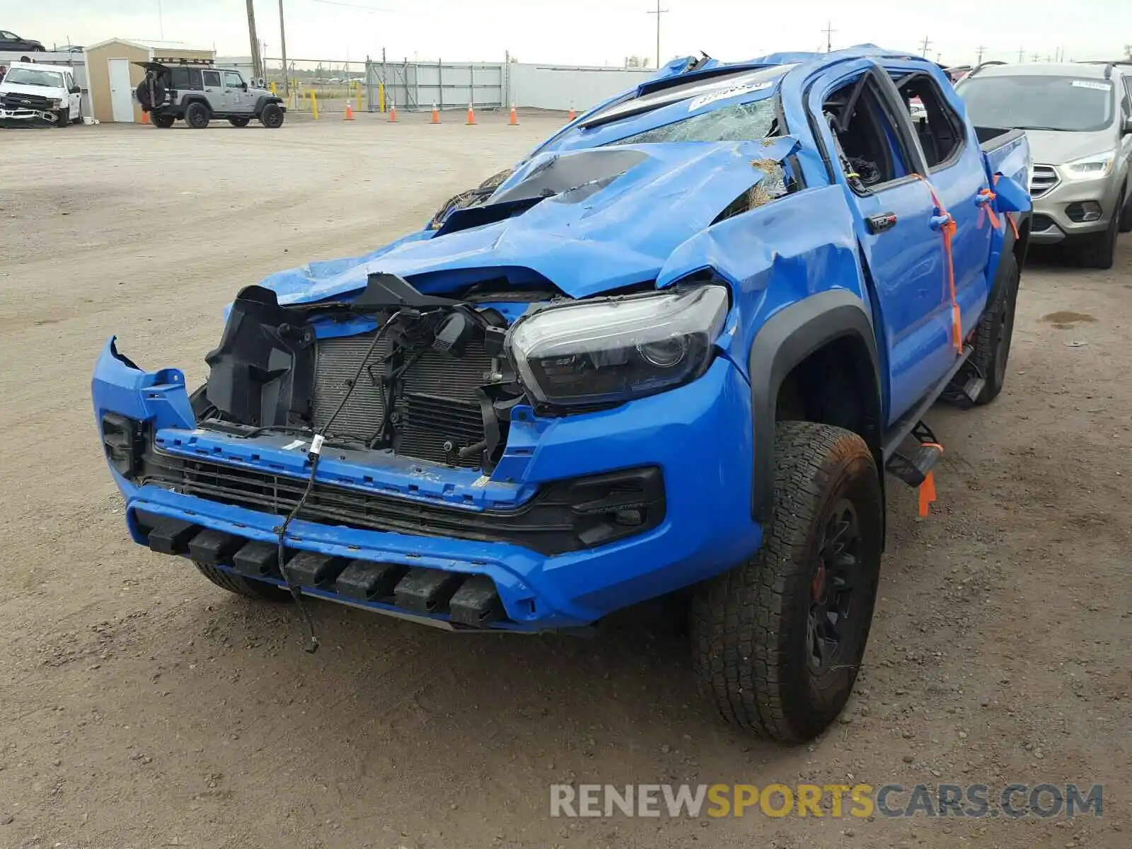 2 Photograph of a damaged car 5TFCZ5AN0KX180097 TOYOTA TACOMA 2019