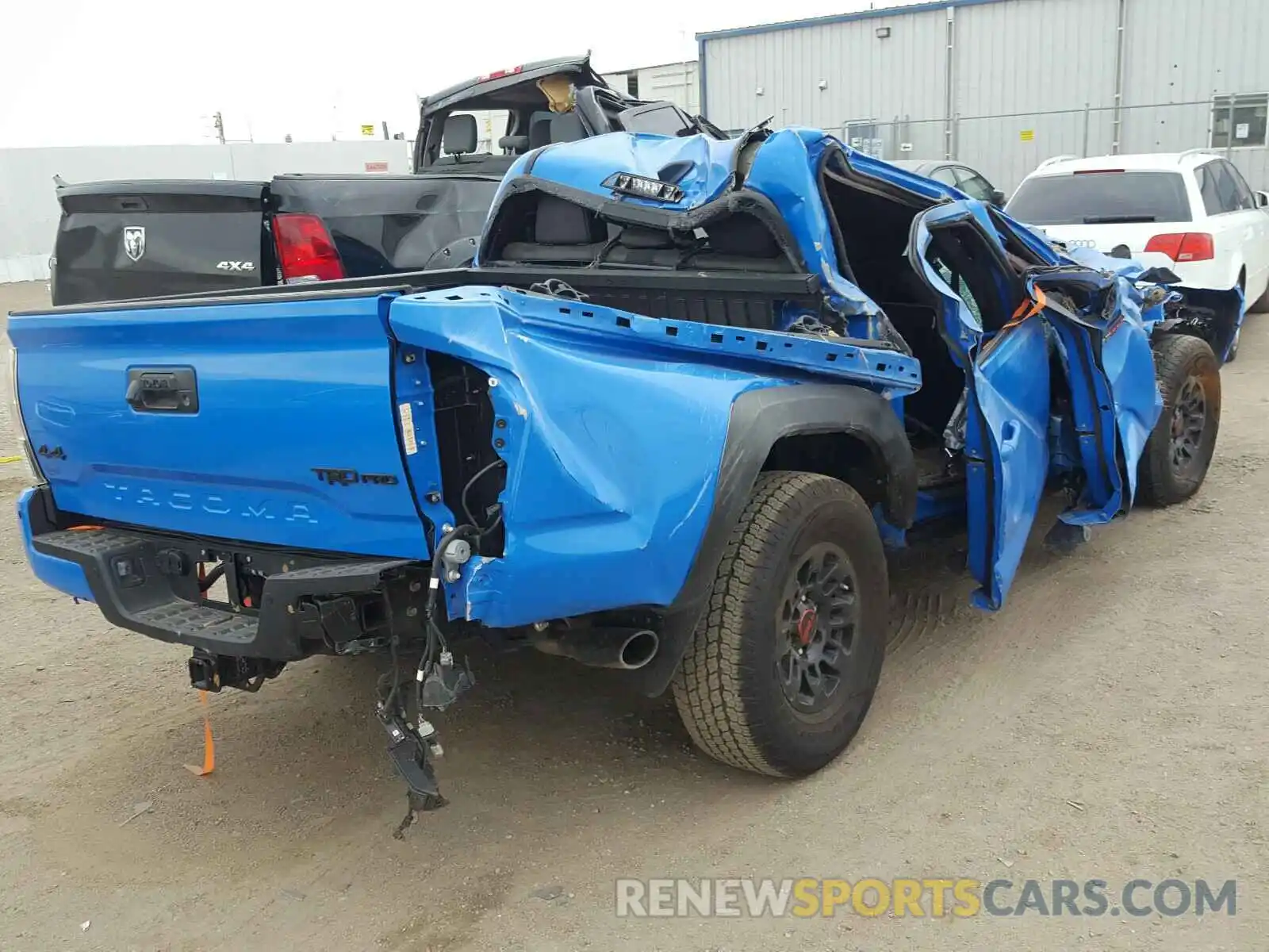 4 Photograph of a damaged car 5TFCZ5AN0KX180097 TOYOTA TACOMA 2019