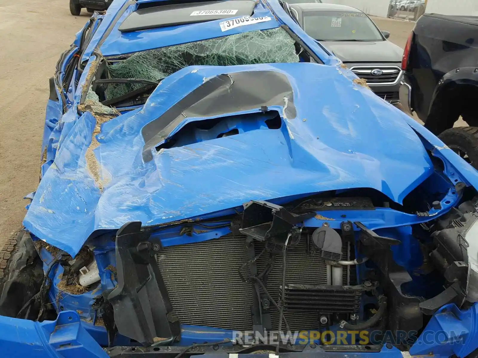 7 Photograph of a damaged car 5TFCZ5AN0KX180097 TOYOTA TACOMA 2019