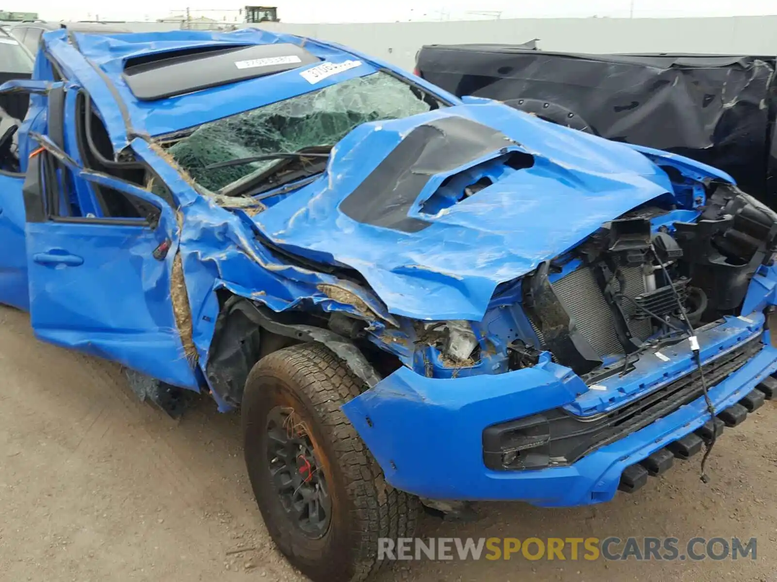 9 Photograph of a damaged car 5TFCZ5AN0KX180097 TOYOTA TACOMA 2019