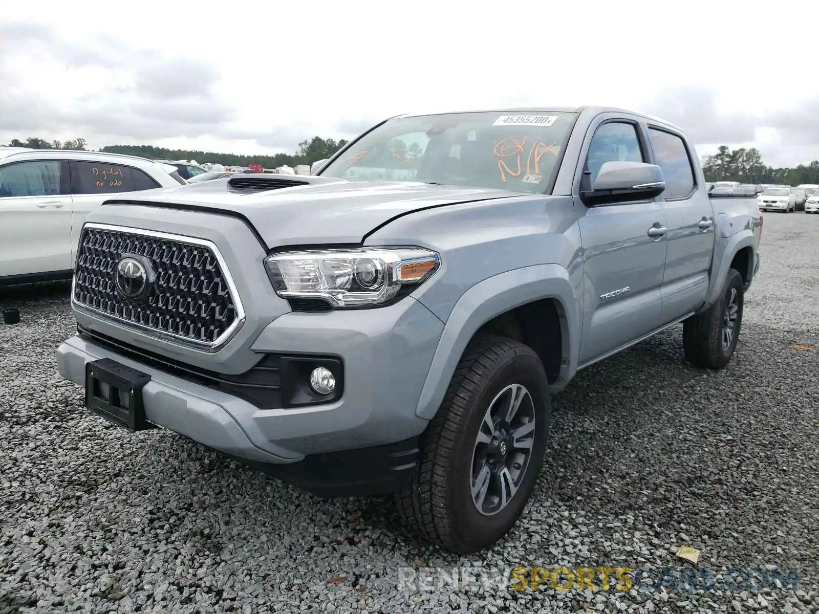 2 Photograph of a damaged car 5TFCZ5AN0KX183145 TOYOTA TACOMA 2019