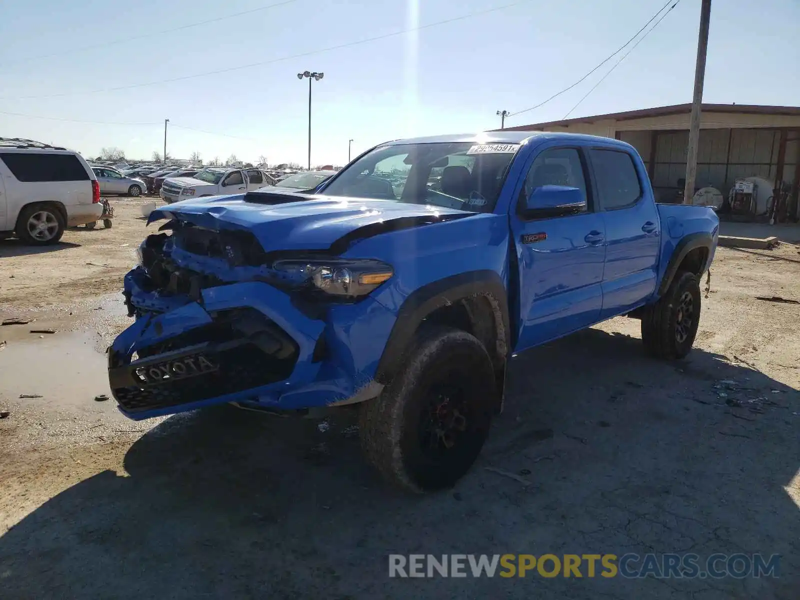 2 Photograph of a damaged car 5TFCZ5AN0KX185056 TOYOTA TACOMA 2019