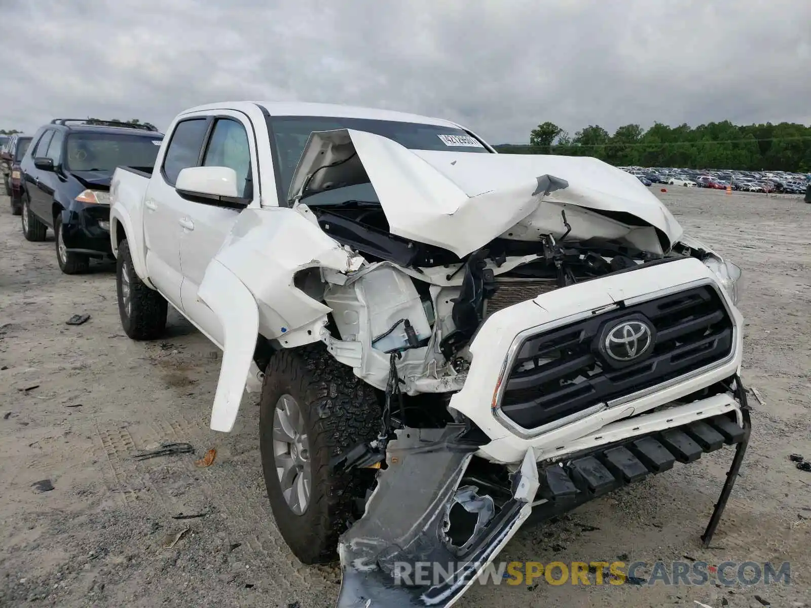 1 Photograph of a damaged car 5TFCZ5AN0KX186997 TOYOTA TACOMA 2019