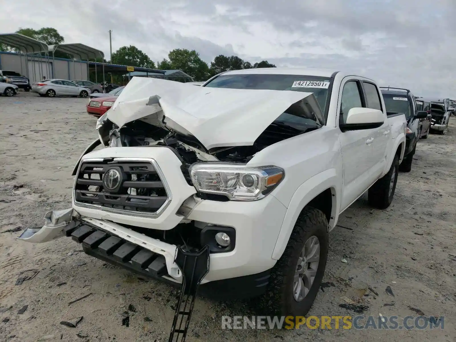 2 Photograph of a damaged car 5TFCZ5AN0KX186997 TOYOTA TACOMA 2019