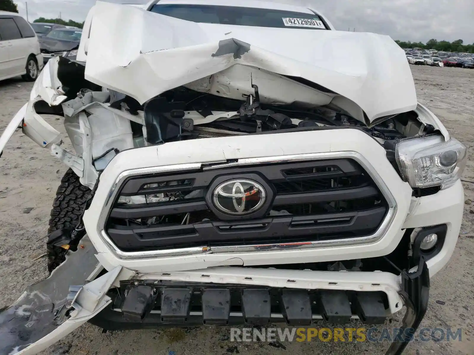 7 Photograph of a damaged car 5TFCZ5AN0KX186997 TOYOTA TACOMA 2019