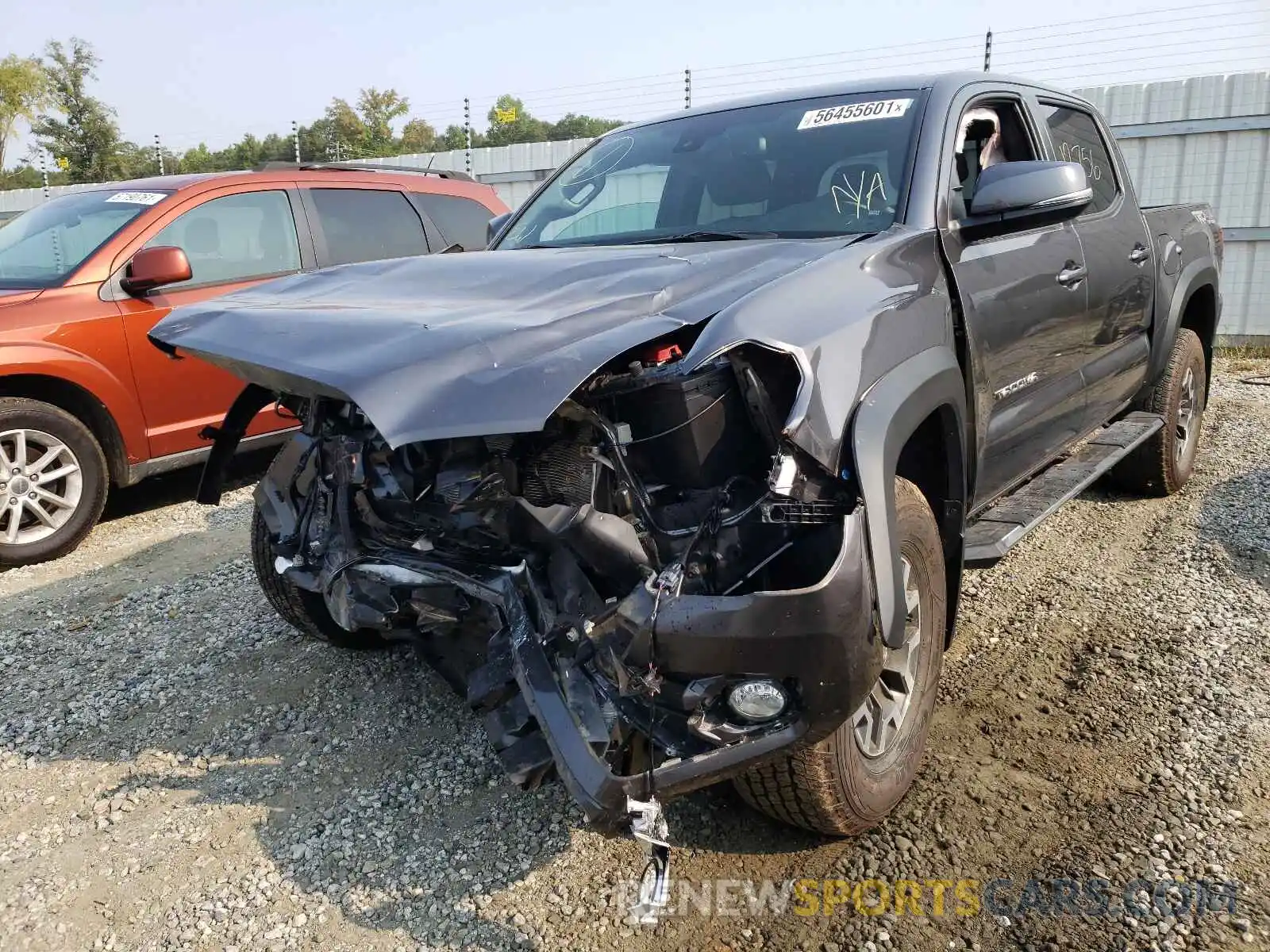 2 Photograph of a damaged car 5TFCZ5AN0KX188426 TOYOTA TACOMA 2019