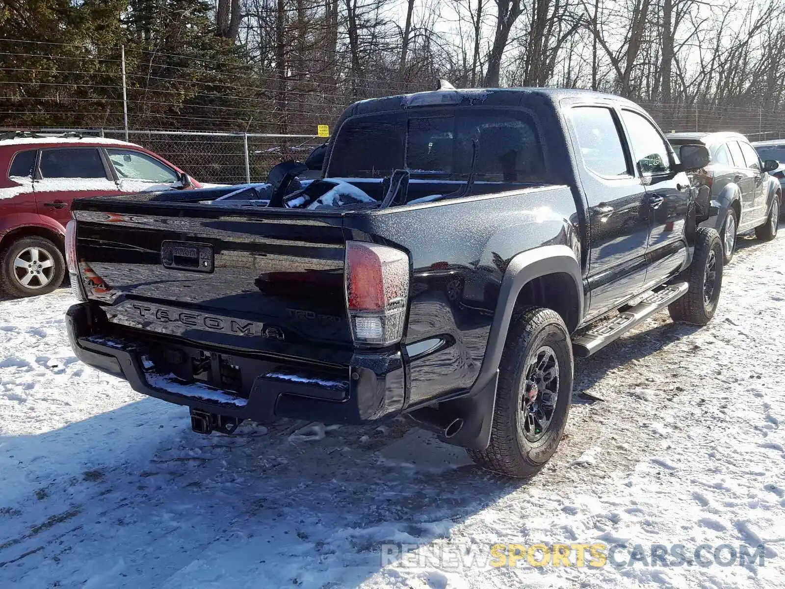 4 Photograph of a damaged car 5TFCZ5AN0KX191343 TOYOTA TACOMA 2019