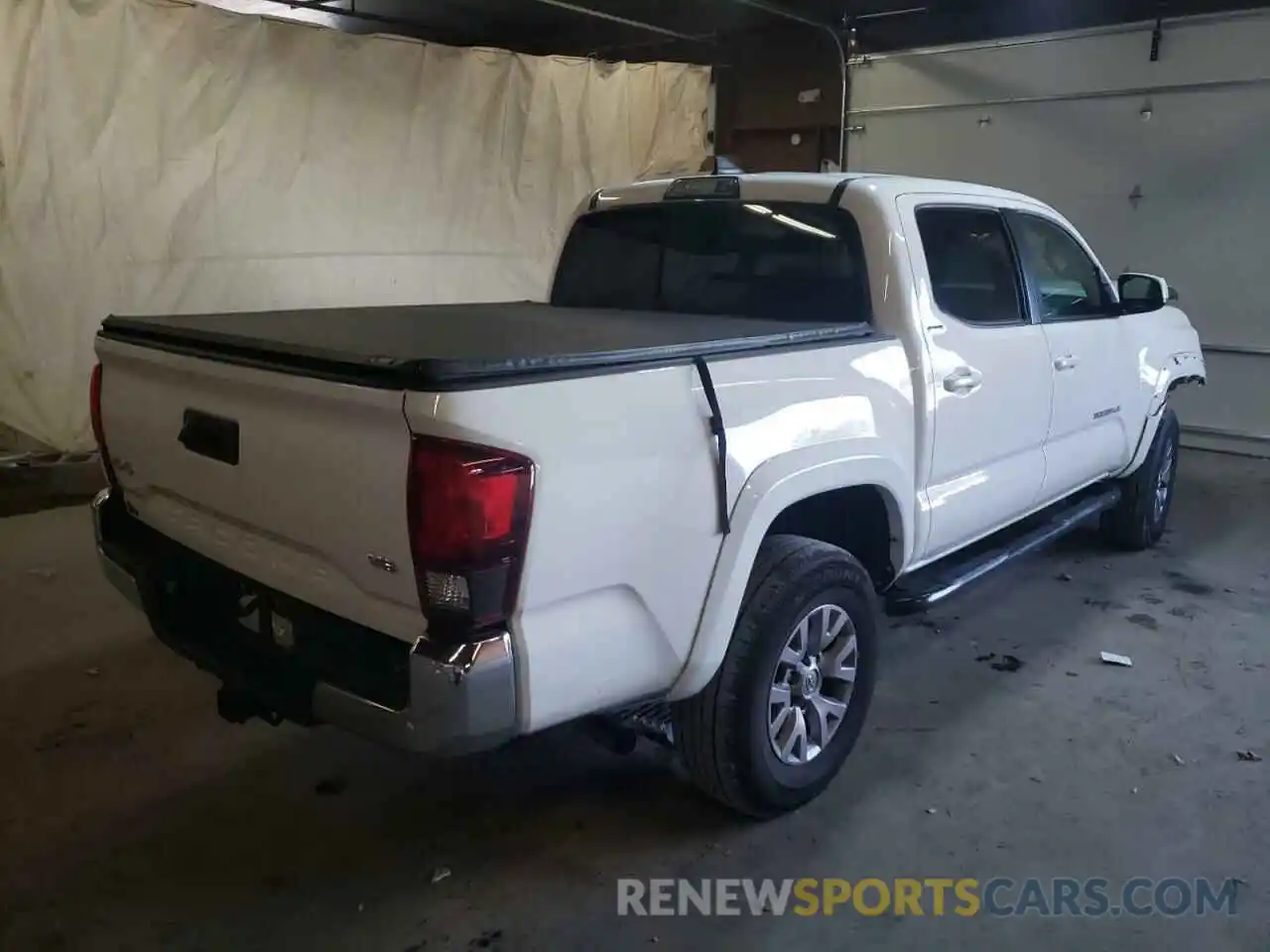 4 Photograph of a damaged car 5TFCZ5AN0KX192444 TOYOTA TACOMA 2019