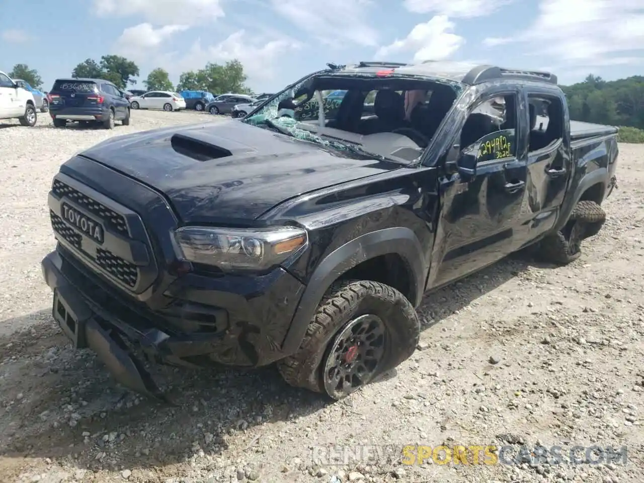 2 Photograph of a damaged car 5TFCZ5AN0KX194405 TOYOTA TACOMA 2019