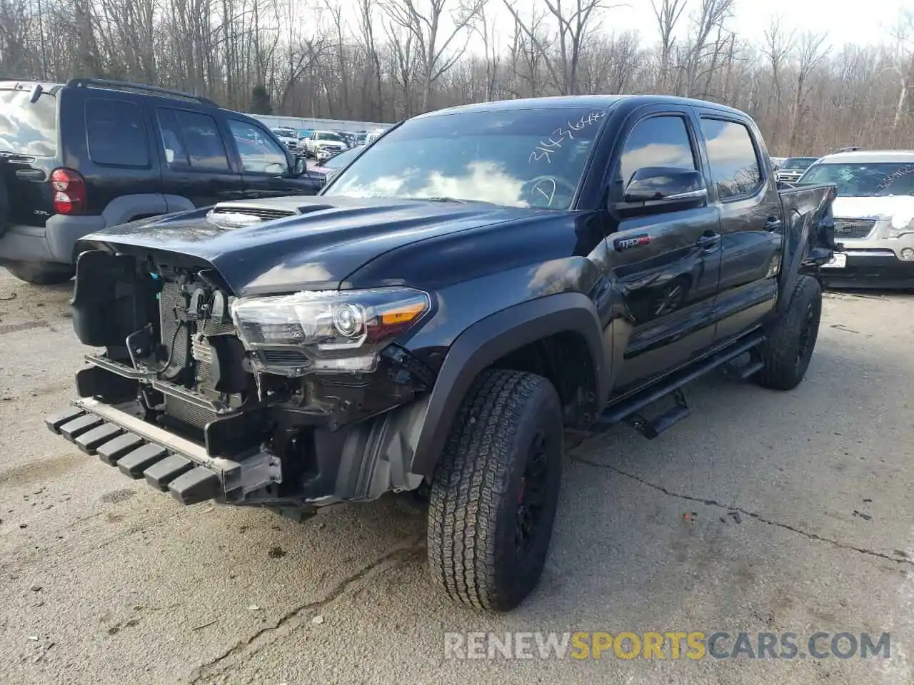 2 Photograph of a damaged car 5TFCZ5AN0KX196624 TOYOTA TACOMA 2019