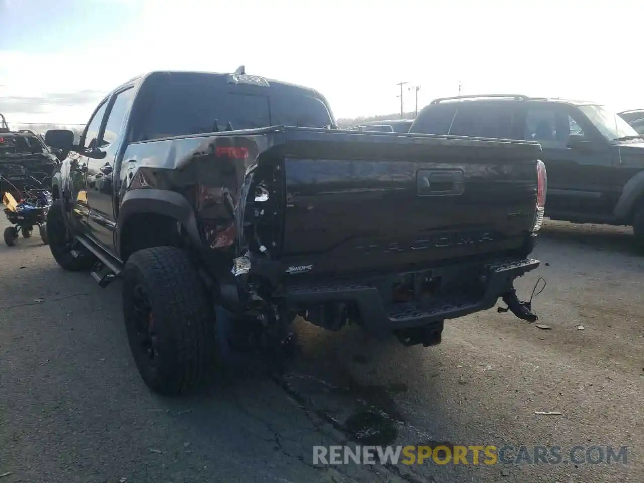 3 Photograph of a damaged car 5TFCZ5AN0KX196624 TOYOTA TACOMA 2019