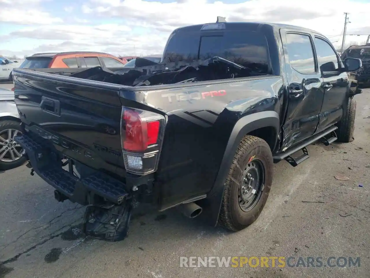 4 Photograph of a damaged car 5TFCZ5AN0KX196624 TOYOTA TACOMA 2019