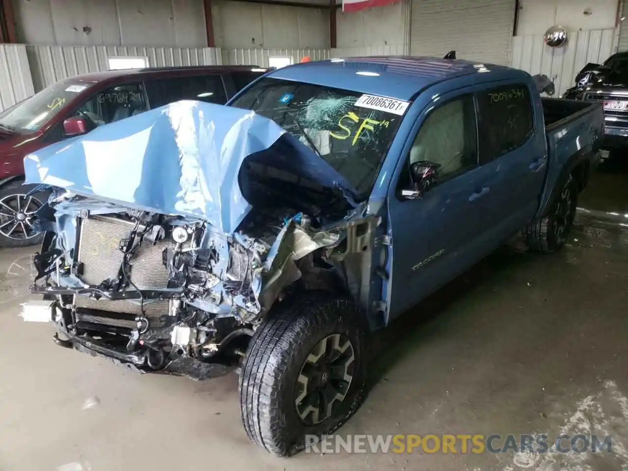 2 Photograph of a damaged car 5TFCZ5AN0KX200879 TOYOTA TACOMA 2019