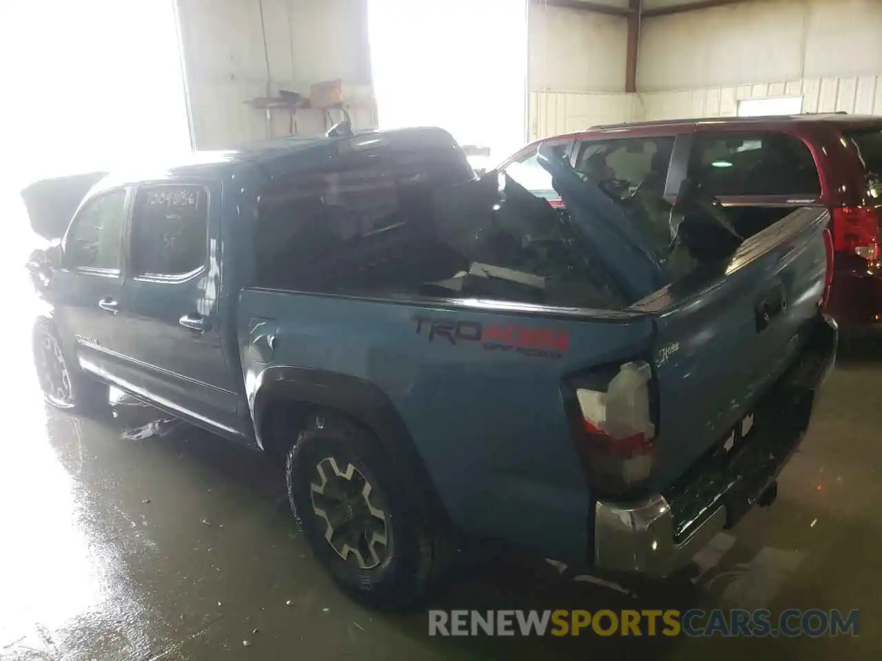 3 Photograph of a damaged car 5TFCZ5AN0KX200879 TOYOTA TACOMA 2019