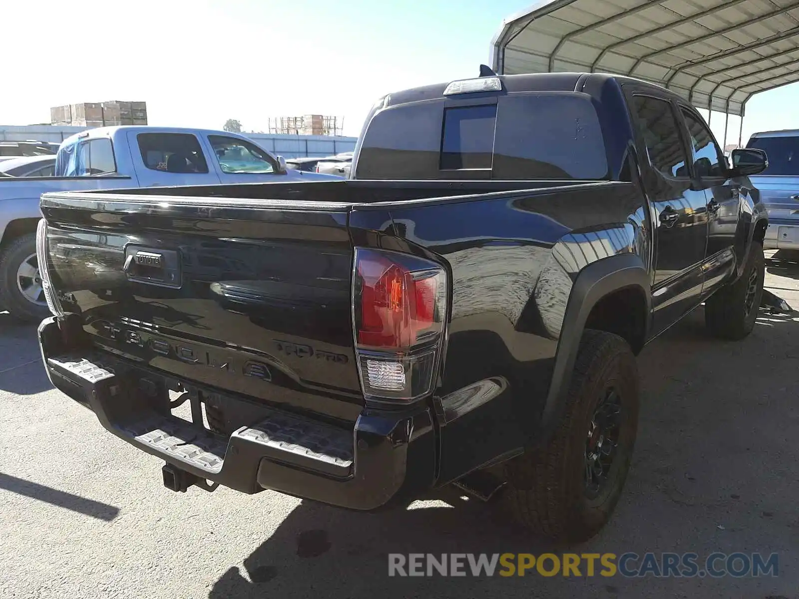 4 Photograph of a damaged car 5TFCZ5AN0KX209789 TOYOTA TACOMA 2019