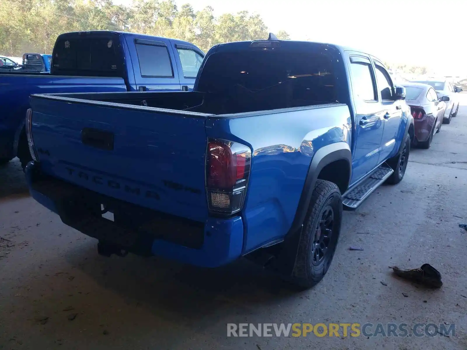 4 Photograph of a damaged car 5TFCZ5AN1KX168198 TOYOTA TACOMA 2019