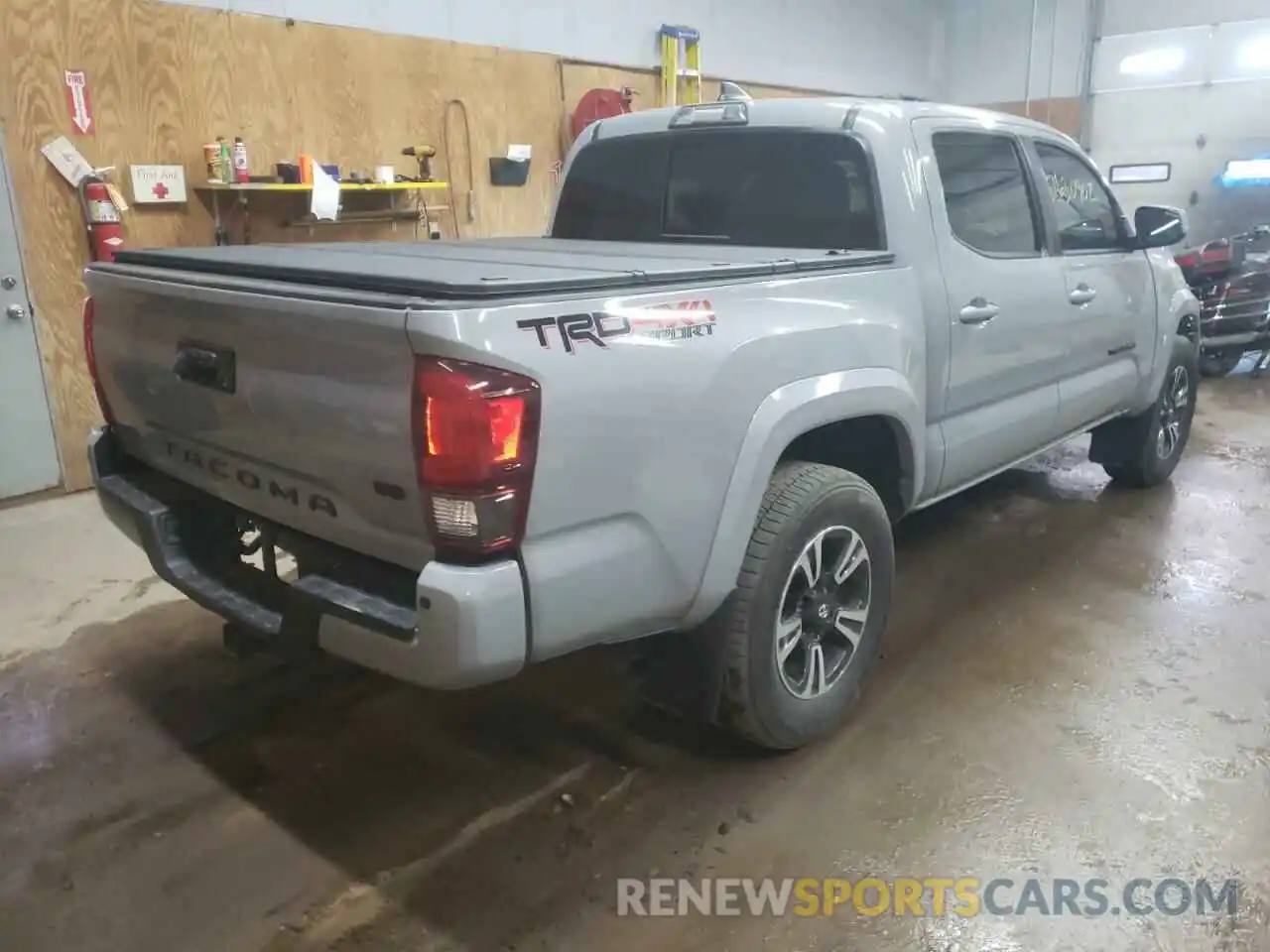 4 Photograph of a damaged car 5TFCZ5AN1KX173028 TOYOTA TACOMA 2019