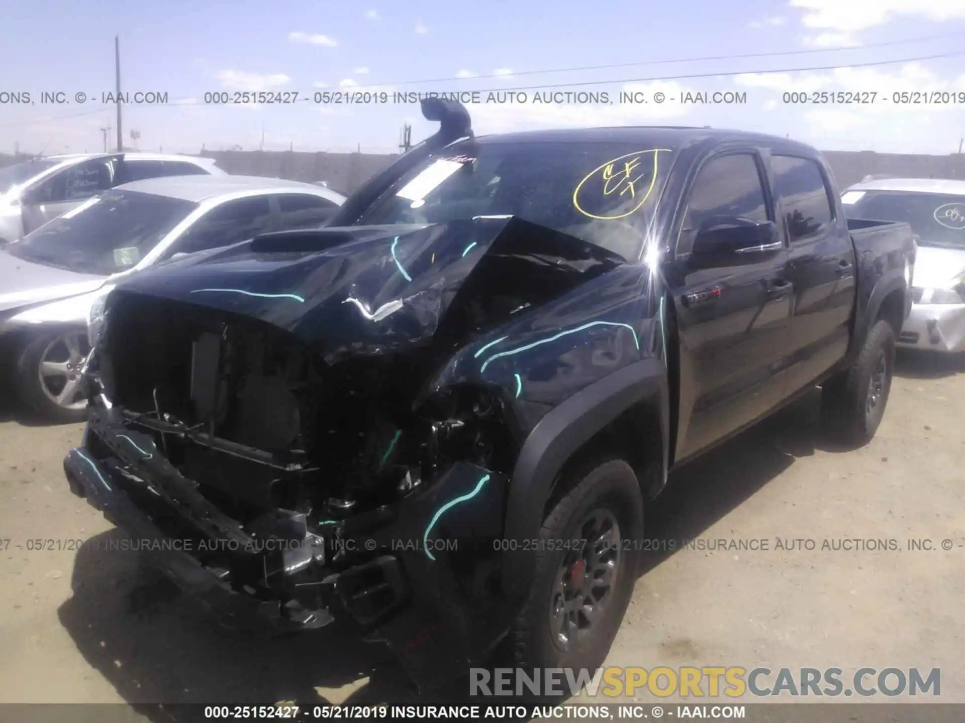 2 Photograph of a damaged car 5TFCZ5AN1KX174308 TOYOTA TACOMA 2019