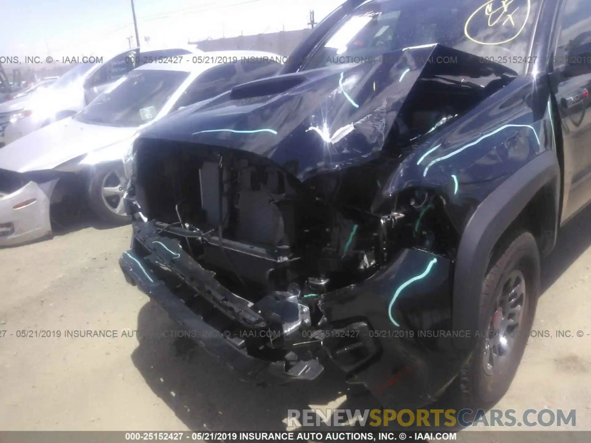 6 Photograph of a damaged car 5TFCZ5AN1KX174308 TOYOTA TACOMA 2019