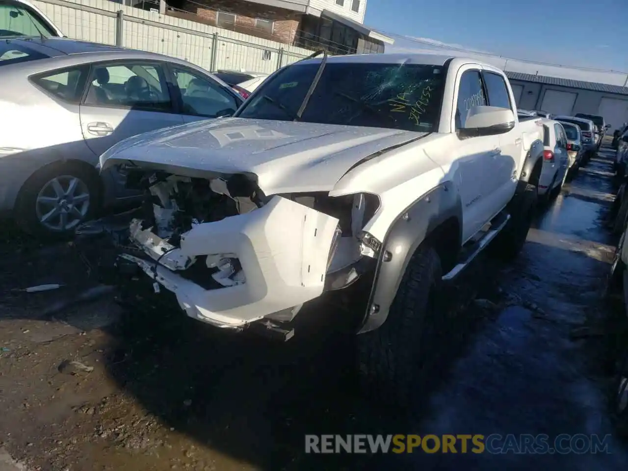 2 Photograph of a damaged car 5TFCZ5AN1KX181811 TOYOTA TACOMA 2019