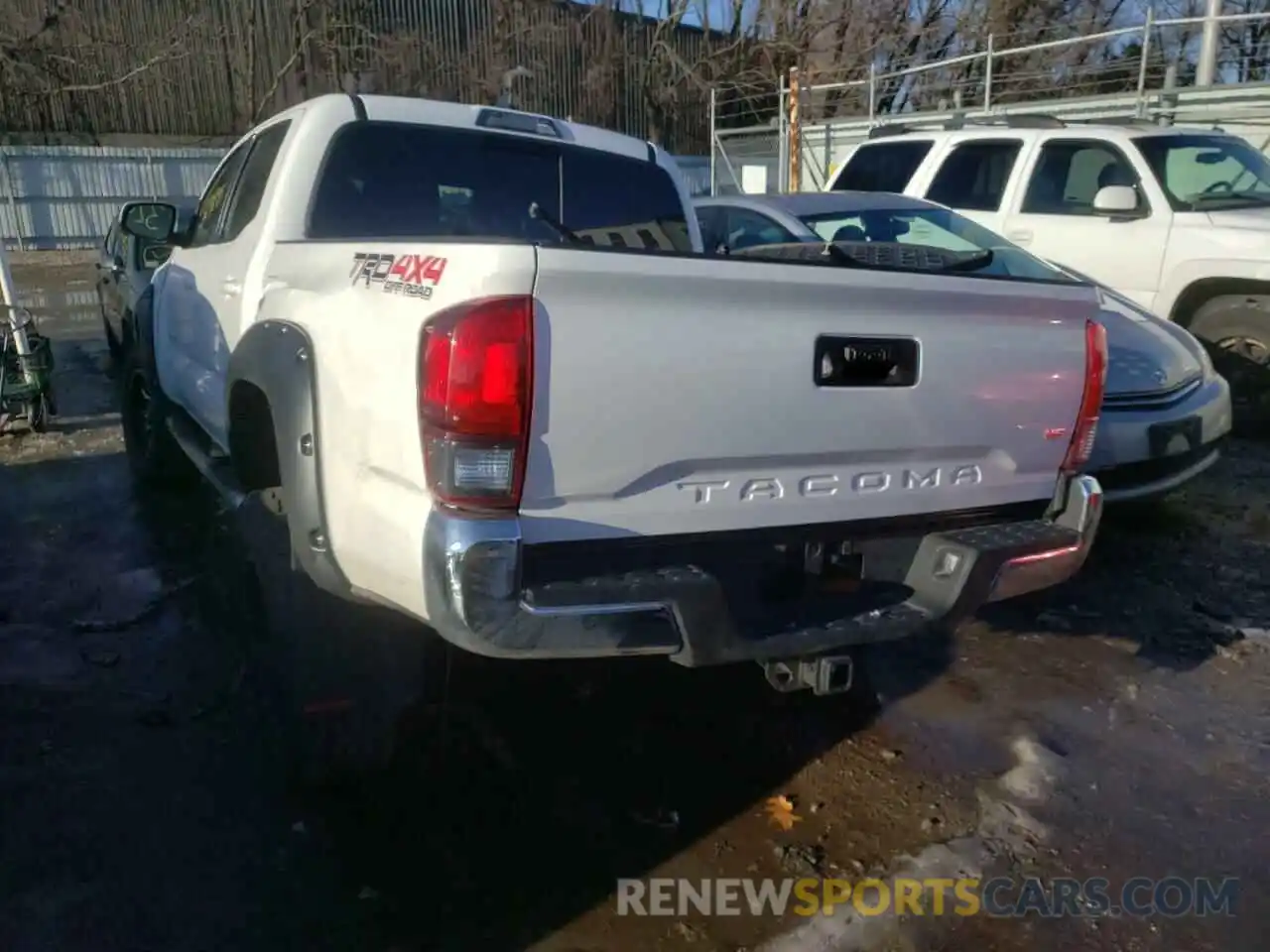 3 Photograph of a damaged car 5TFCZ5AN1KX181811 TOYOTA TACOMA 2019