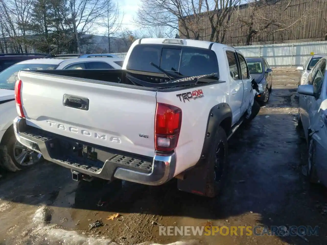 4 Photograph of a damaged car 5TFCZ5AN1KX181811 TOYOTA TACOMA 2019