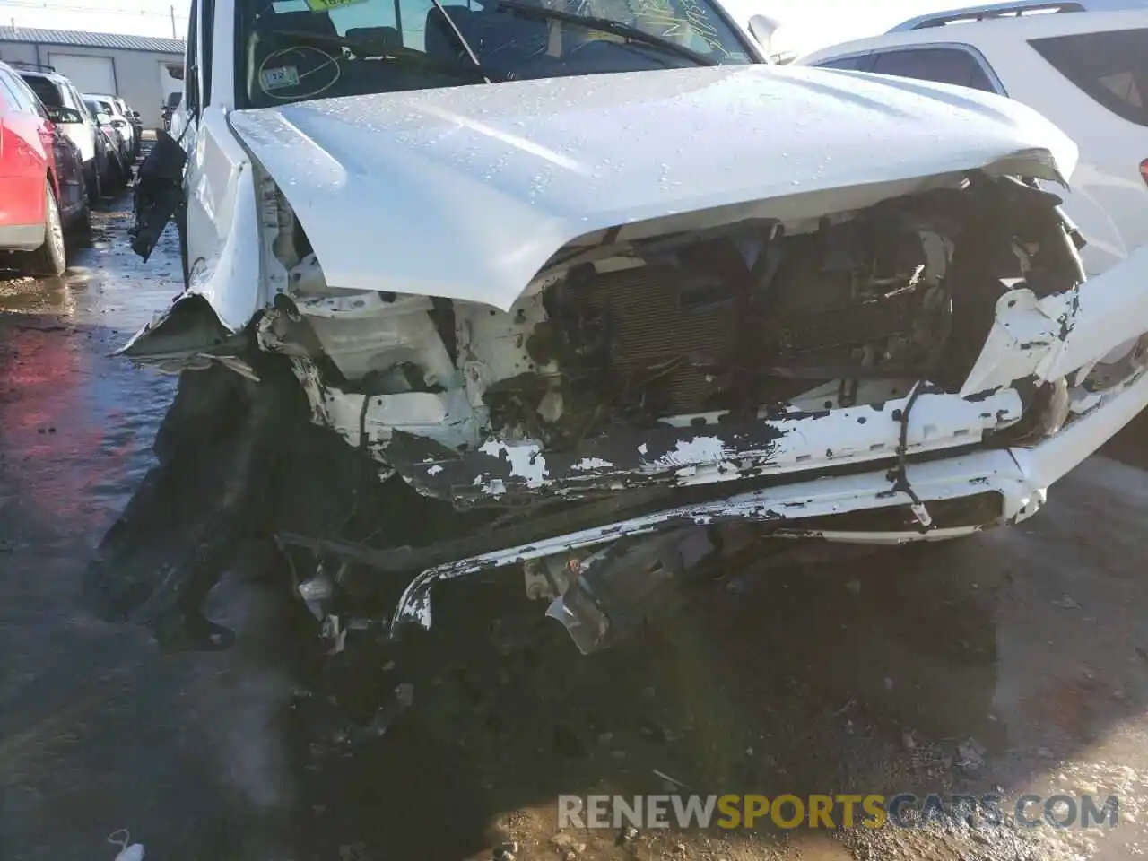 7 Photograph of a damaged car 5TFCZ5AN1KX181811 TOYOTA TACOMA 2019