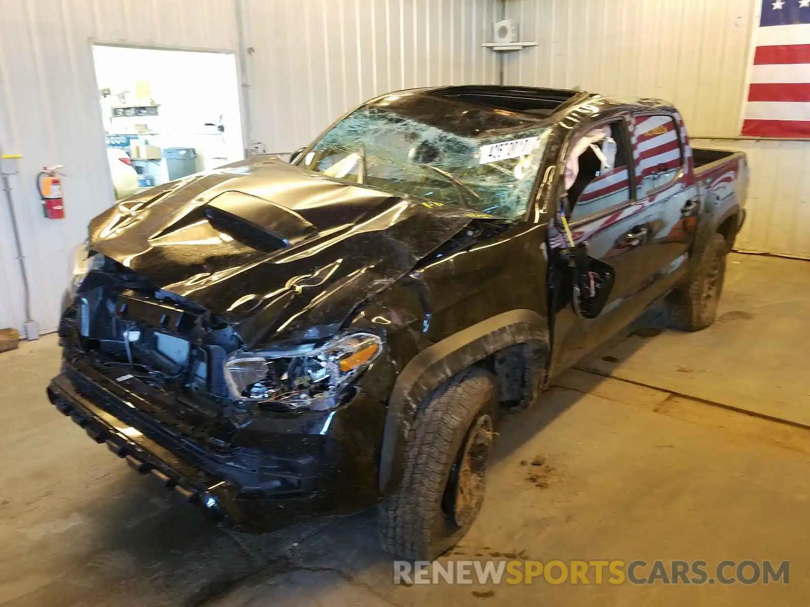 2 Photograph of a damaged car 5TFCZ5AN1KX188323 TOYOTA TACOMA 2019